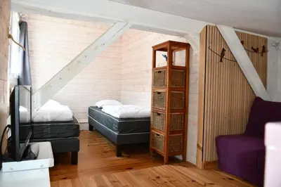 Un ou plusieurs lits dans un hébergement de l'établissement Gîte Le Cincle au cœur du massif des Vosges