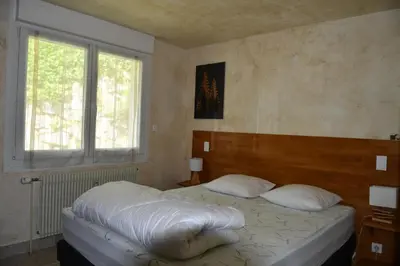 Un ou plusieurs lits dans un hébergement de l'établissement Gîte Le Cincle au cœur du massif des Vosges
