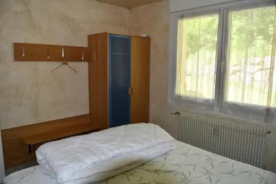 Un ou plusieurs lits dans un hébergement de l'établissement Gîte Le Cincle au cœur du massif des Vosges
