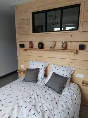 Un ou plusieurs lits dans un hébergement de l'établissement L'escale du centre du lac, joli appartement T2, proche lac