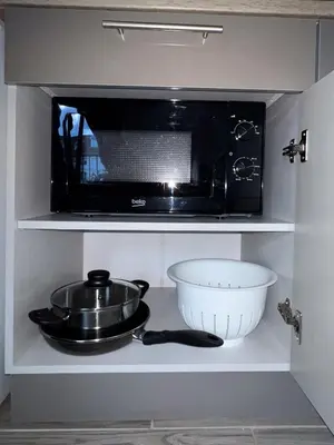 Cuisine ou kitchenette dans l'établissement Studio Le Maréchal - Près frontière et Netflix