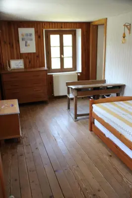 Un ou plusieurs lits dans un hébergement de l'établissement LA CHAUMIERE DE TAVOU