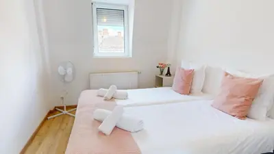 Un ou plusieurs lits dans un hébergement de l'établissement Appartements Rue du Chêne