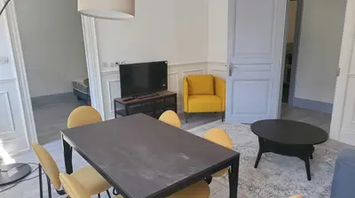 Coin salon dans l'établissement Appartements Rue du Chêne