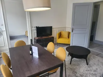 Télévision ou salle de divertissement dans l'établissement Appartements Rue du Chêne