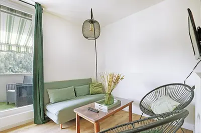 Coin salon dans l'établissement L'Epicéa - Appartement vue montagne