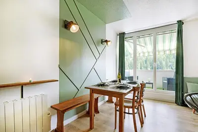 Coin salon dans l'établissement L'Epicéa - Appartement vue montagne