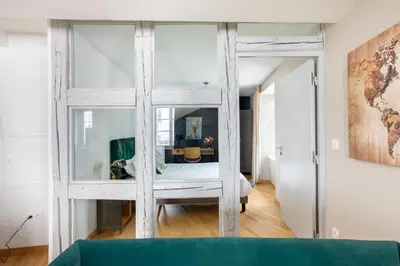 Télévision ou salle de divertissement dans l'établissement Appartement de l'Arsenal
