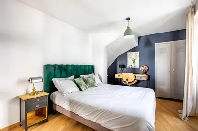 Un ou plusieurs lits dans un hébergement de l'établissement Appartement de l'Arsenal
