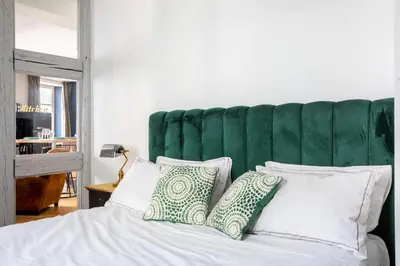 Un ou plusieurs lits dans un hébergement de l'établissement Appartement de l'Arsenal