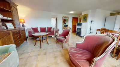 Coin salon dans l'établissement Le Clos de Charlotte