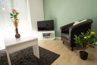 Télévision ou salle de divertissement dans l'établissement NEW appartement proche gare et centre-ville