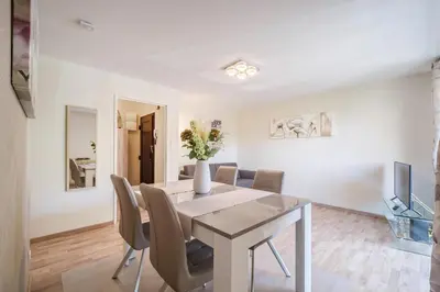 Coin salon dans l'établissement La Symphonie - Joli appt à Colmar
