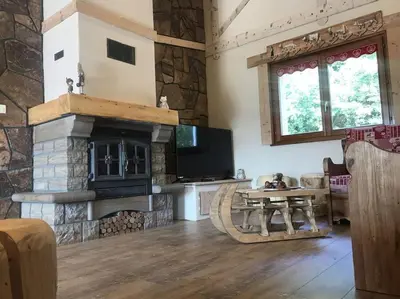 Cuisine ou kitchenette dans l'établissement Chalet SPA Le Diamant Nathalie MN La Rouge
