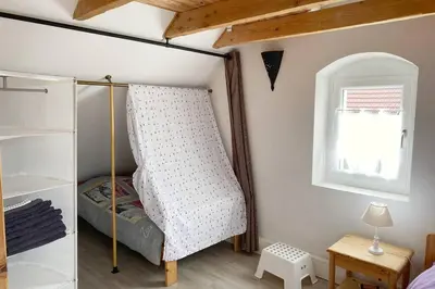 Un ou plusieurs lits dans un hébergement de l'établissement Maisonnette Alsacienne cosy