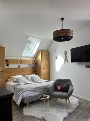 Un ou plusieurs lits dans un hébergement de l'établissement Les Gîtes de Juliane - Calme & spa en altitude - Alsace