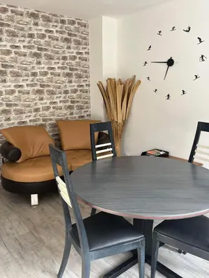 Coin salon dans l'établissement Nid douillet à La Bresse