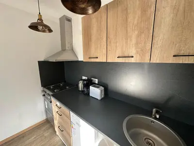 Cuisine ou kitchenette dans l'établissement Cour ancienne école avec Jacuzzi privé