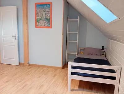 Un ou plusieurs lits dans un hébergement de l'établissement Maison de ville avec jardin-Rêve à Rixheim!