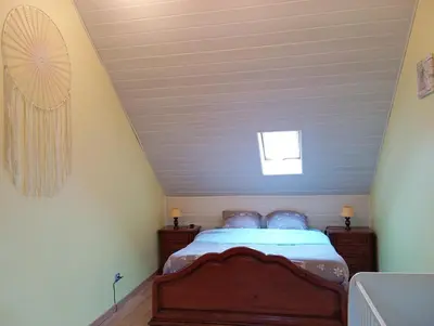 Un ou plusieurs lits dans un hébergement de l'établissement Maison de ville avec jardin-Rêve à Rixheim!