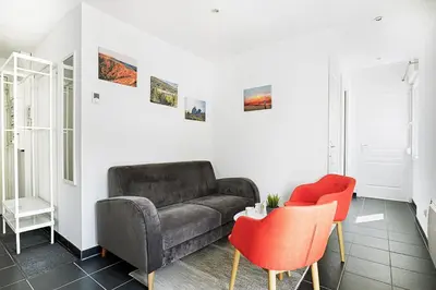 Coin salon dans l'établissement L'évasion - Charmant appt pour 4