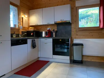 Cuisine ou kitchenette dans l'établissement L'Orpin Givré - Chalet Limoselle avec grande mezzanine