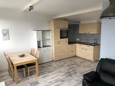 Cuisine ou kitchenette dans l'établissement Camping du Château