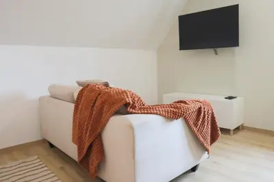 Télévision ou salle de divertissement dans l'établissement Le Cocon, Paisible & Doux