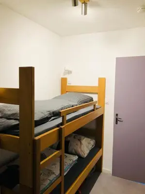 Un ou plusieurs lits dans un hébergement de l'établissement Le Darou Bressaud