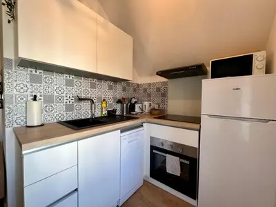 Cuisine ou kitchenette dans l'établissement La Cour de Clemenceau