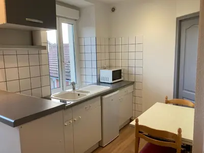 Cuisine ou kitchenette dans l'établissement Studio fonctionnel, étage 2, proche Techn'hom, IUT et UTBM