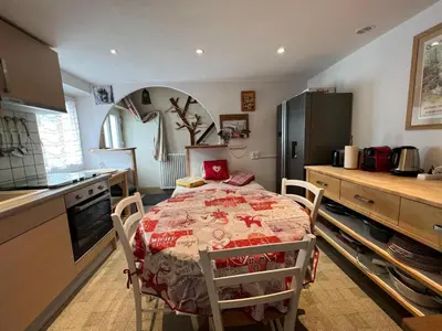 Cuisine ou kitchenette dans l'établissement Charmant gîte au coeur du Centre Ville