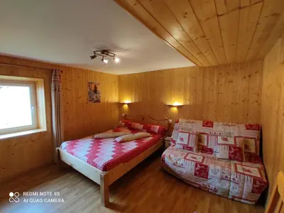 Un ou plusieurs lits dans un hébergement de l'établissement Charmant gîte au coeur du Centre Ville