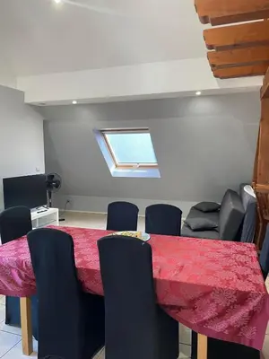 Coin salon dans l'établissement GITE SPACIEUX AU COEUR DE L'ALSACE 3***