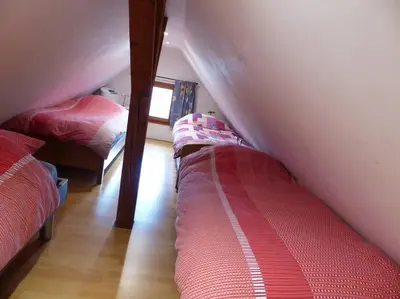 Un ou plusieurs lits dans un hébergement de l'établissement GITE SPACIEUX AU COEUR DE L'ALSACE 3***