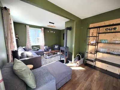 Coin salon dans l'établissement Maison Les Planches
