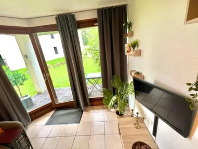 Coin salon dans l'établissement Joli studio cosy, vue magnifique et terrasse privée