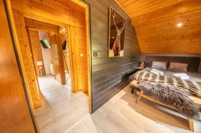 Un ou plusieurs lits dans un hébergement de l'établissement F'amis Lodge, 10p avec baby-foot