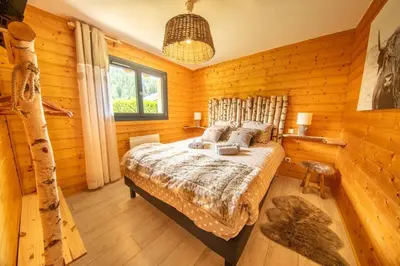 Un ou plusieurs lits dans un hébergement de l'établissement F'amis Lodge, 10p avec baby-foot