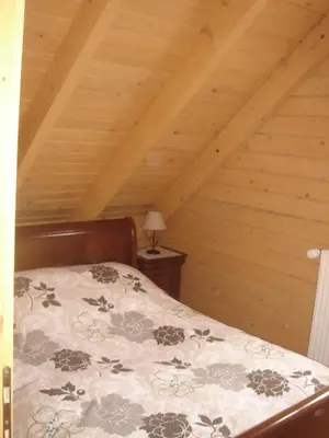 Un ou plusieurs lits dans un hébergement de l'établissement CHALET DU FLORIVAL