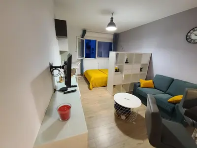 Coin salon dans l'établissement Magnifique Studio 26m2