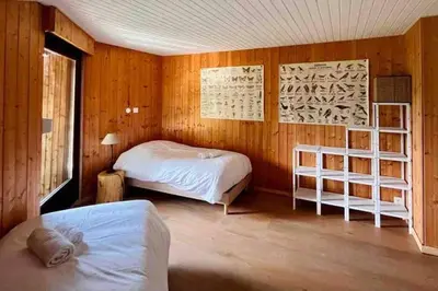 Un ou plusieurs lits dans un hébergement de l'établissement Chalet Alto