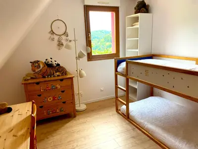 Un ou plusieurs lits dans un hébergement de l'établissement Grande maison bi-familiale, belle vue, piscine