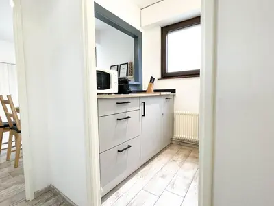 Cuisine ou kitchenette dans l'établissement Le Studio Bleu*10' centre*Parking*Balcon