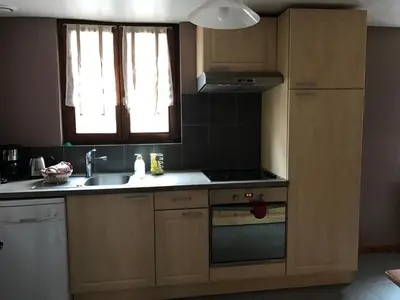 Cuisine ou kitchenette dans l'établissement Les Authentics - La Maison d'Amélie