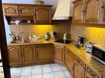 Cuisine ou kitchenette dans l'établissement Le petit coin des oliviers