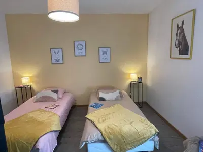 Un ou plusieurs lits dans un hébergement de l'établissement Le petit coin des oliviers