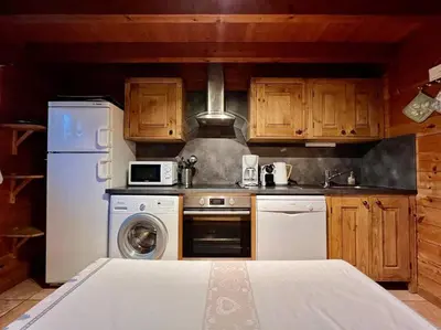 Cuisine ou kitchenette dans l'établissement Chalet Baudelaire, 4* beau et authentique
