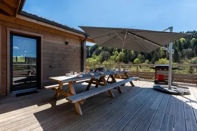 Balcon ou terrasse dans l'établissement Chalet Victorine, vue imprenable avec spa