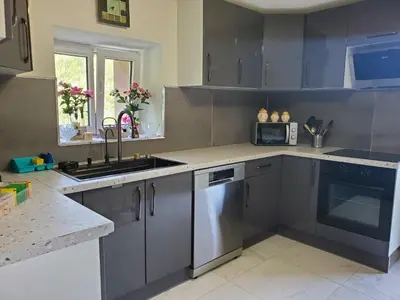 Cuisine ou kitchenette dans l'établissement CHEZ ESTER